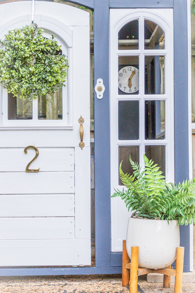 detail shot of playhouse front door and accessories