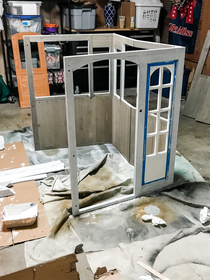 KidKraft playhouse with one coat of Kilz primer on it.