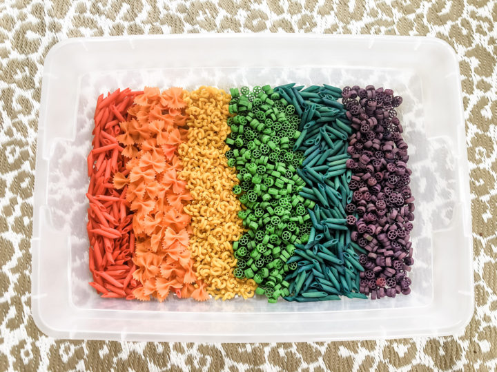 Rainbow-dyed pasta sensory bin for toddlers