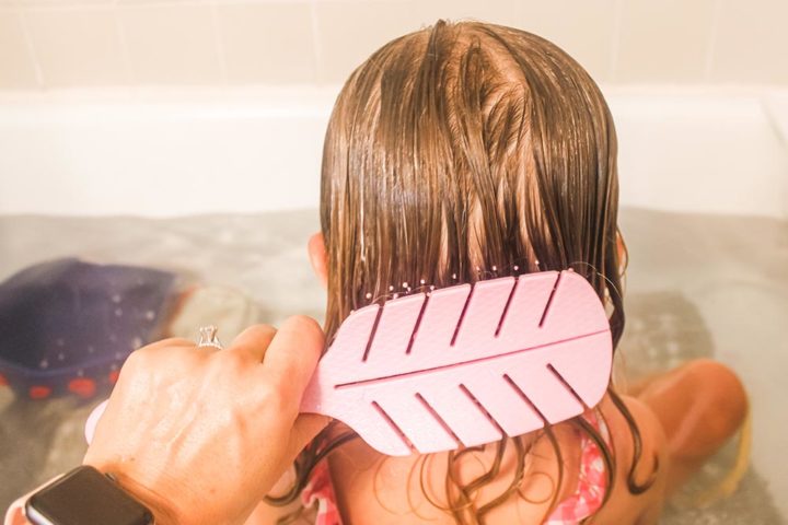 Wet Brush's Go Detangling Brush helps get tangles out of curly toddler hair